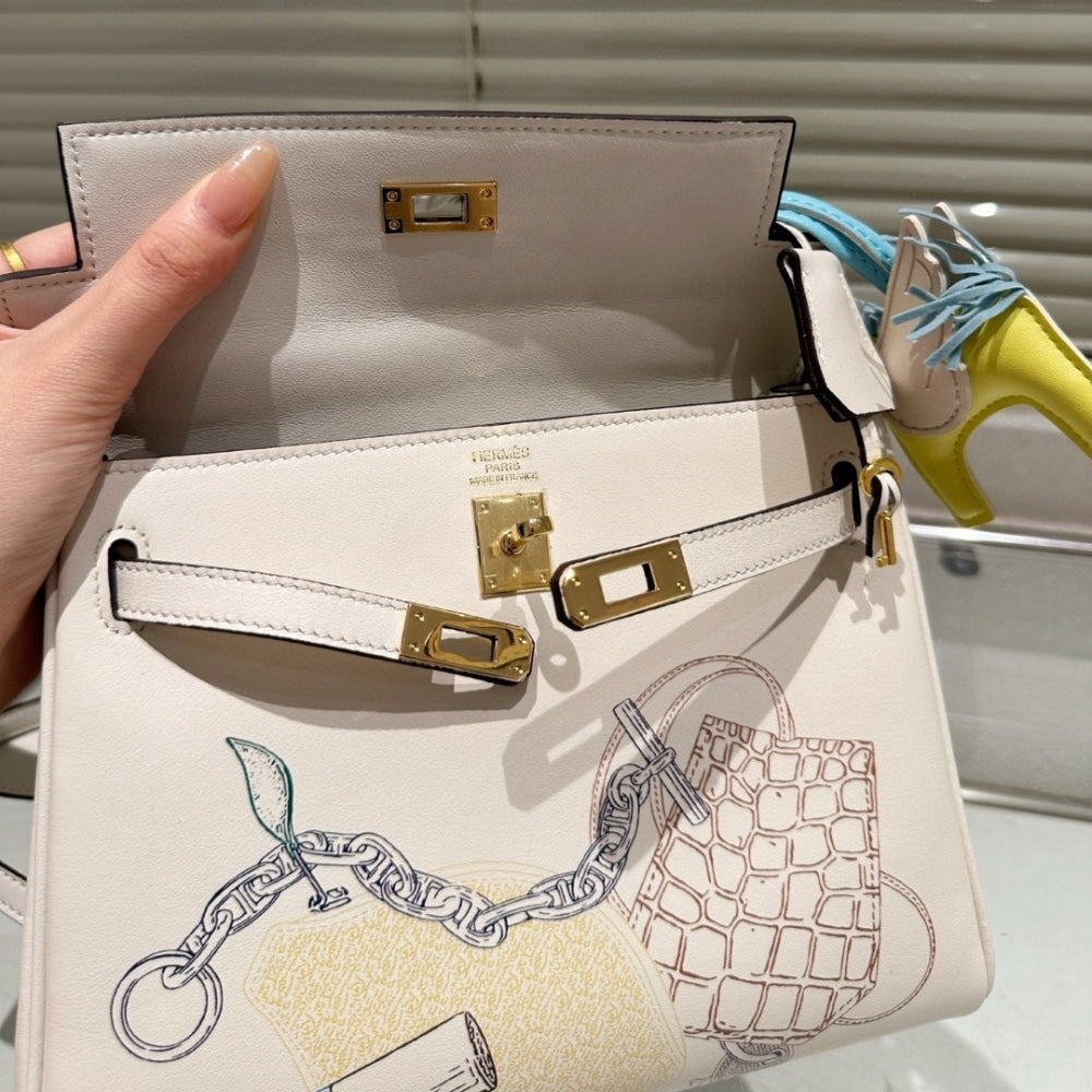 HERMÈS KELLY 25 RETOURNE IN AND OUT NATA SWIFT PALLADIUM HARDWARE 25CM