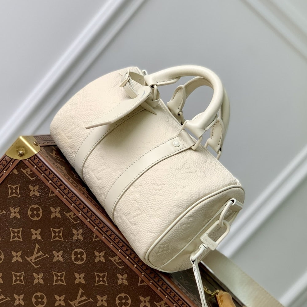 LOUIS VUITTON KEEPALL BANDOULIÈRE 25 BAG CREAM 25CM M24434