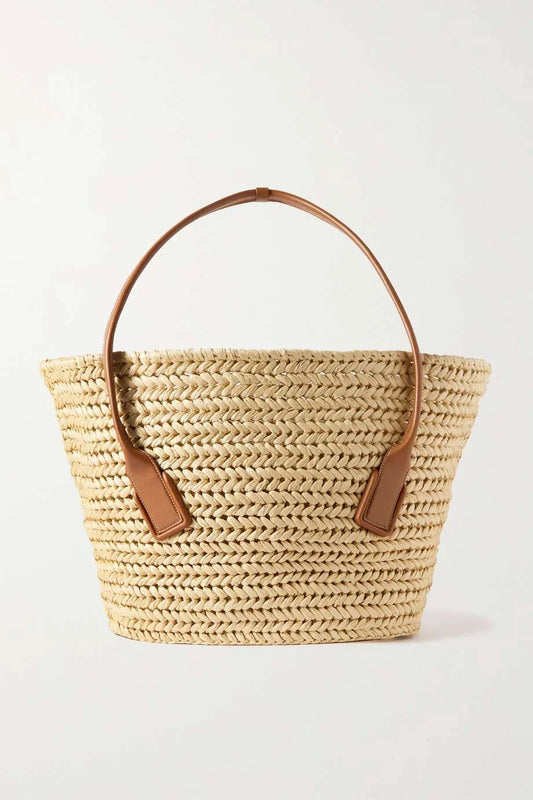 BOTTEGA VENETA Medium leather-trimmed raffia tote