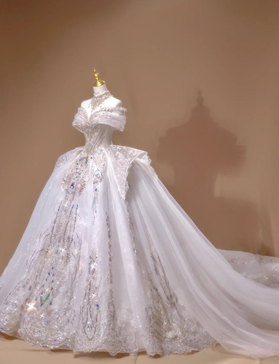 Gorgeous Off-the-shoulder A-Line Tulle Beaded Train Wedding Dress ED02434