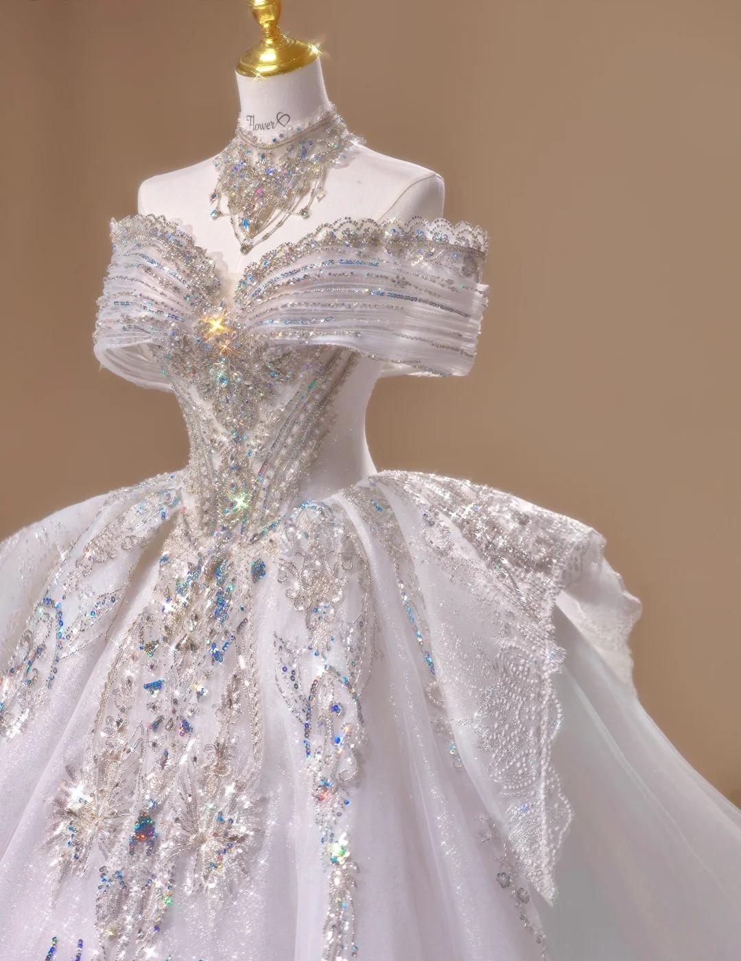 Gorgeous Off-the-shoulder A-Line Tulle Beaded Train Wedding Dress ED02434