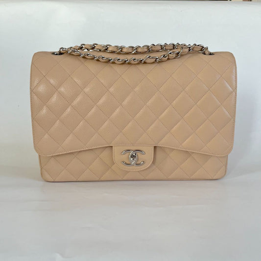 Chanel beige caviar quilted leather maxi double flap bag