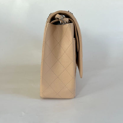 Chanel beige caviar quilted leather maxi double flap bag