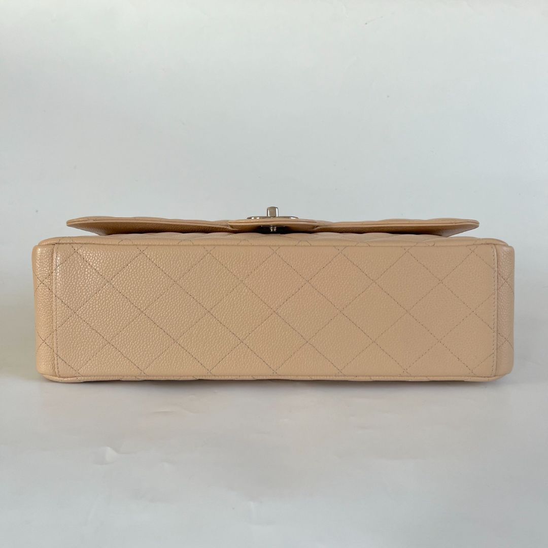 Chanel beige caviar quilted leather maxi double flap bag