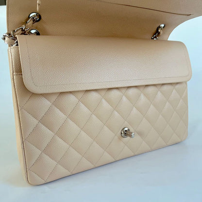 Chanel beige caviar quilted leather maxi double flap bag