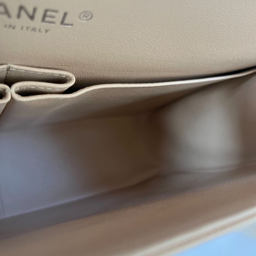 Chanel beige caviar quilted leather maxi double flap bag