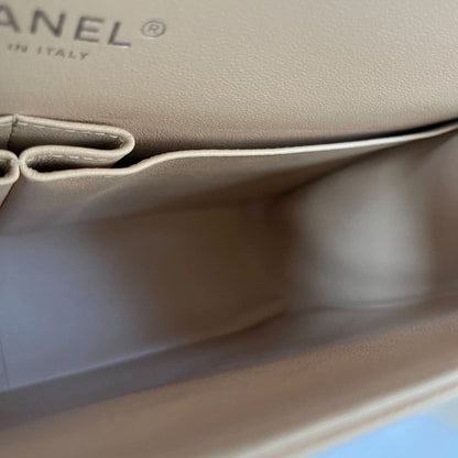 Chanel beige caviar quilted leather maxi double flap bag