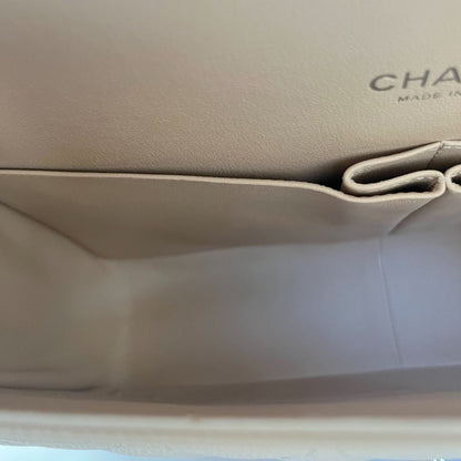 Chanel beige caviar quilted leather maxi double flap bag