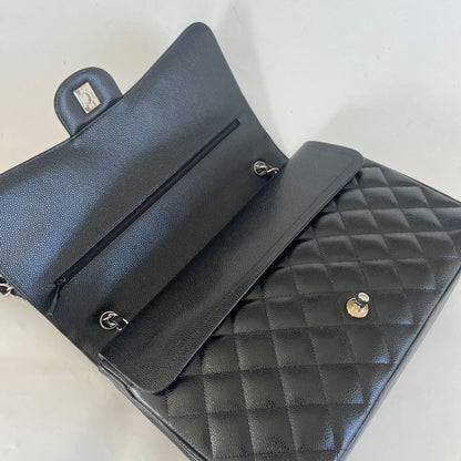 Chanel Black Maxi Classic Caviar Double Flap