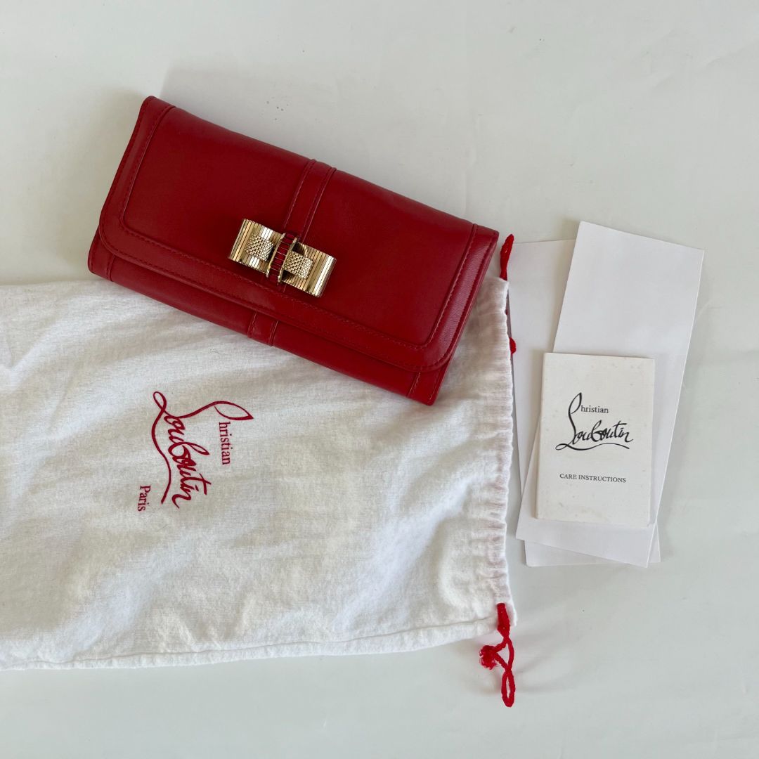Christian Louboutin red leather bow flap long wallet