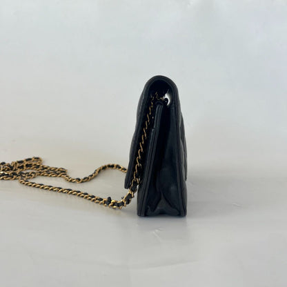 Chanel black quilted lambskin wallet on chain crossbody bag