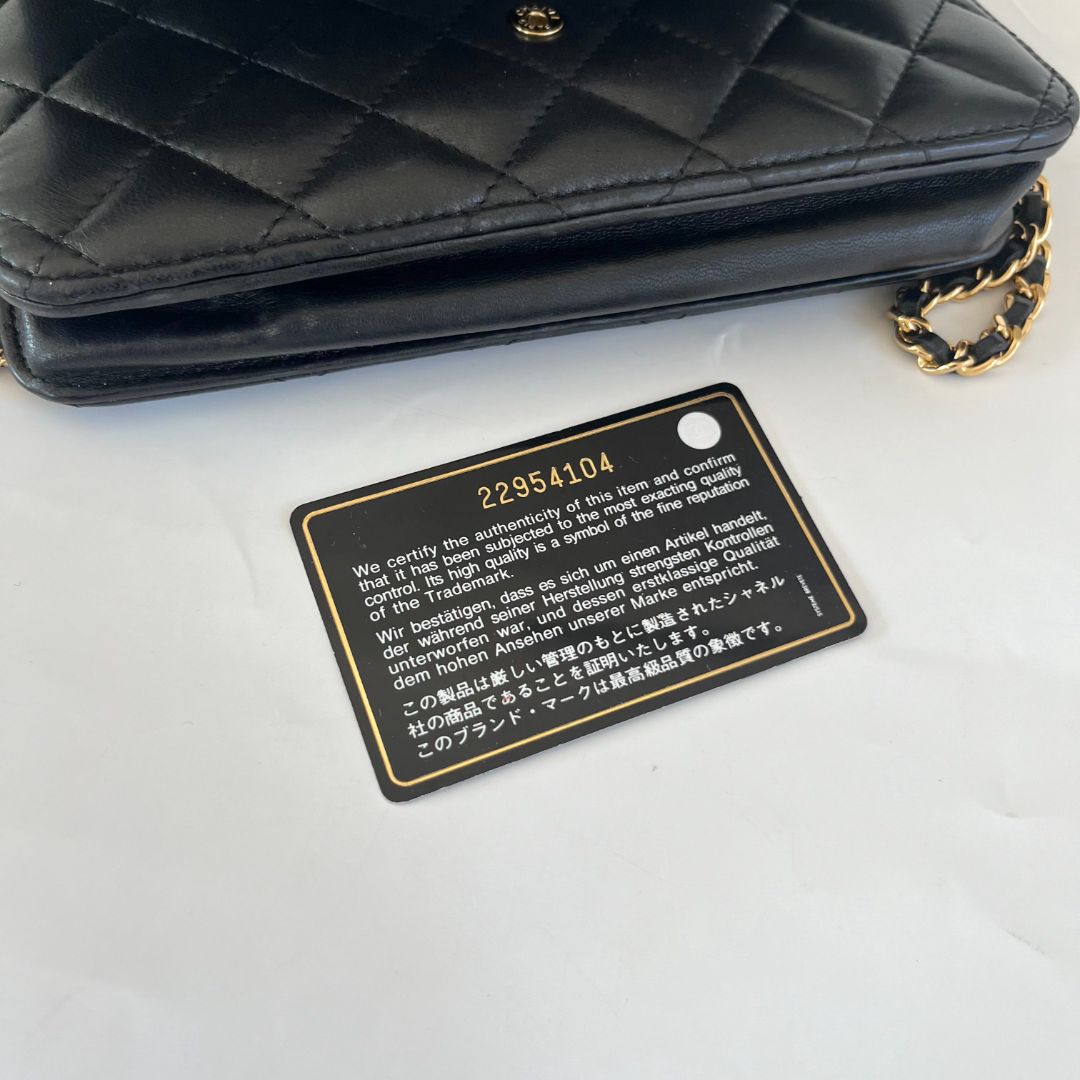 Chanel black quilted lambskin wallet on chain crossbody bag