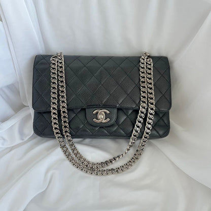 Chanel caviar black flap bag with silver hardware