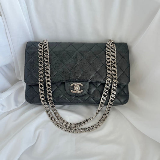 Chanel caviar black flap bag with silver hardware