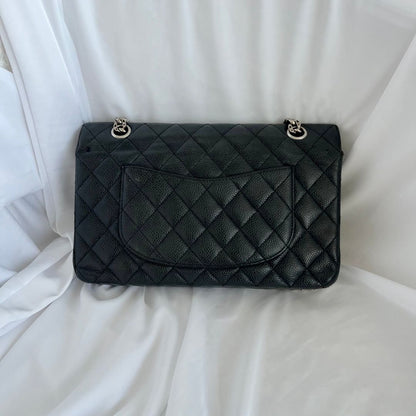 Chanel caviar black flap bag with silver hardware