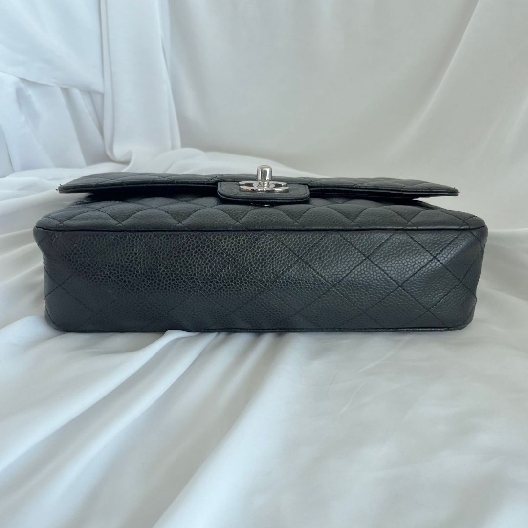 Chanel caviar black flap bag with silver hardware