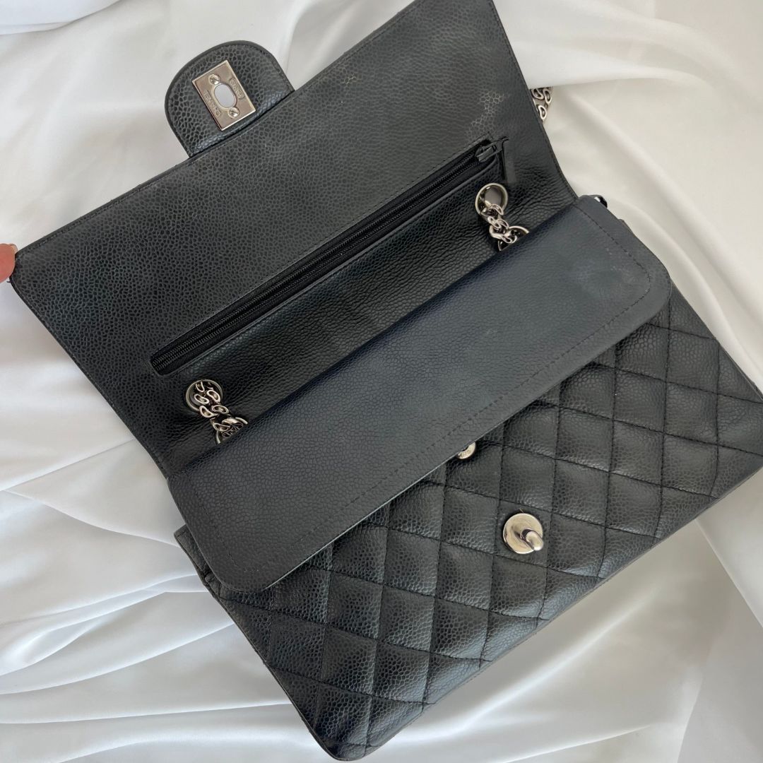 Chanel caviar black flap bag with silver hardware