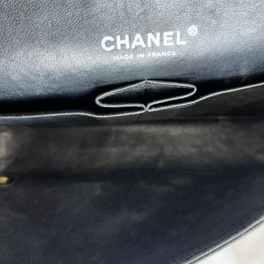 Chanel caviar black flap bag with silver hardware