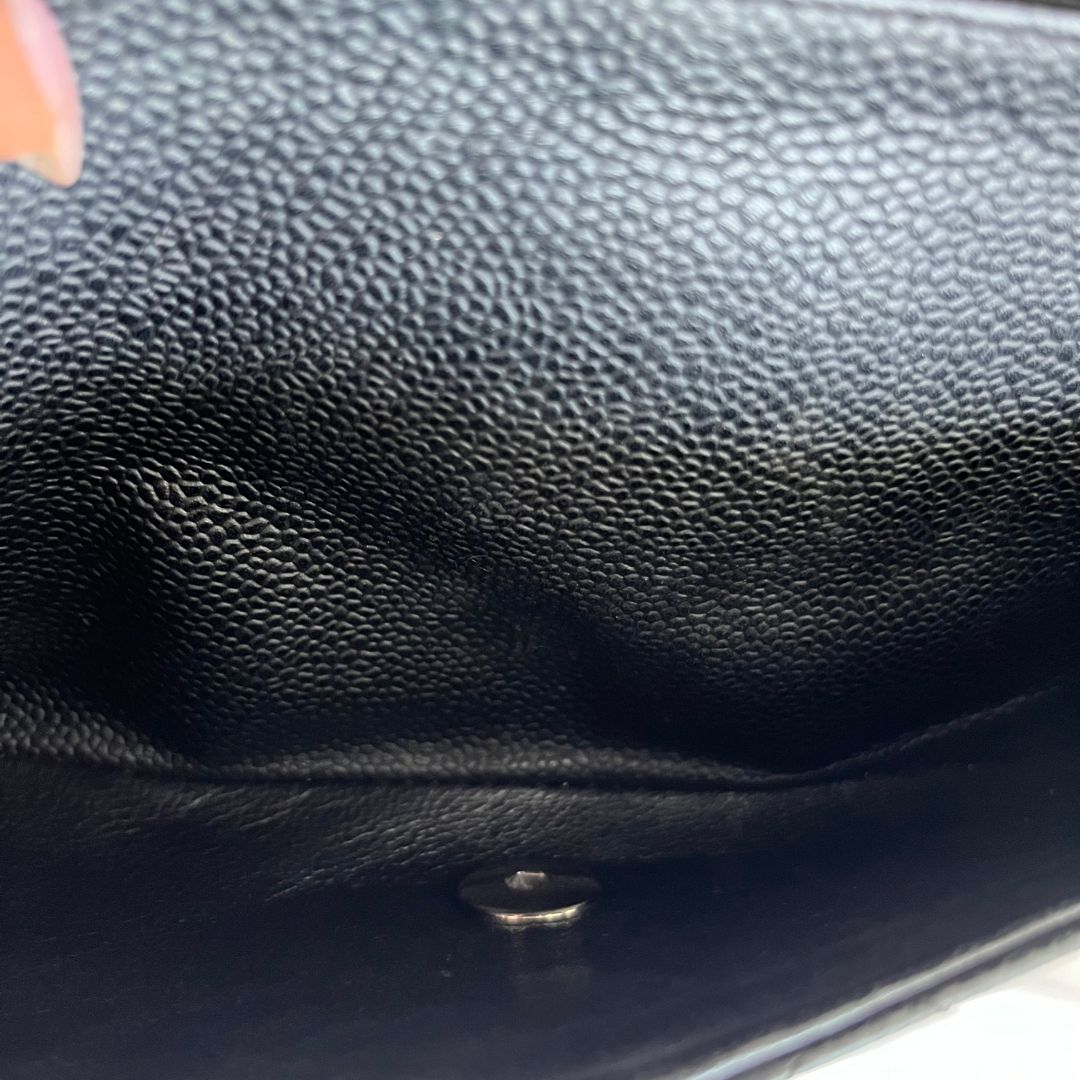 Chanel caviar black flap bag with silver hardware