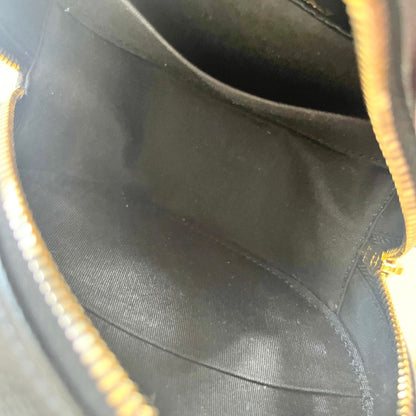 Chanel black caviar round bag