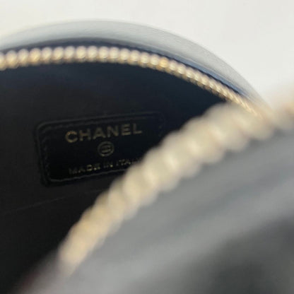 Chanel black caviar round bag