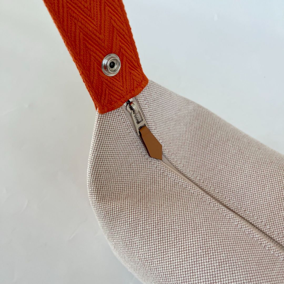 Hermes Trousse de Toilette Bride a Brac Small Model Natural / Orange PM Bag