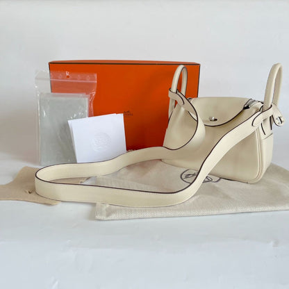 Hermès Mini Lindy Swift leather nata with lime yellow lining bag