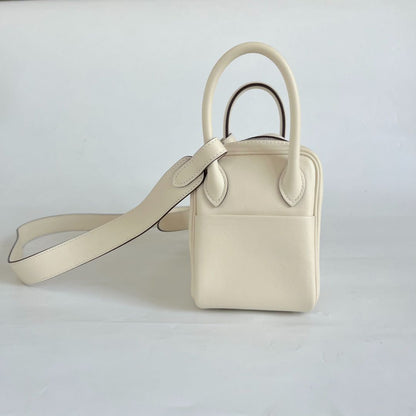 Hermès Mini Lindy Swift leather nata with lime yellow lining bag