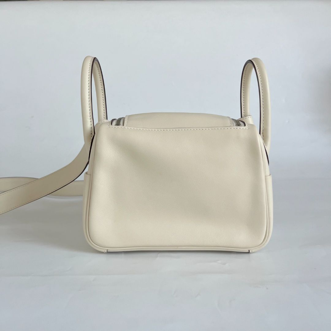 Hermès Mini Lindy Swift leather nata with lime yellow lining bag