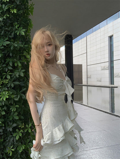 Sweet hot girl style irregular ruffled floral suspender long skirt ED0417