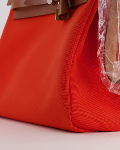 Hermès Herbag 39 in Orange Mecano Toile Canvas and Fauve Vache Hunter Leather with Palladium Hardware