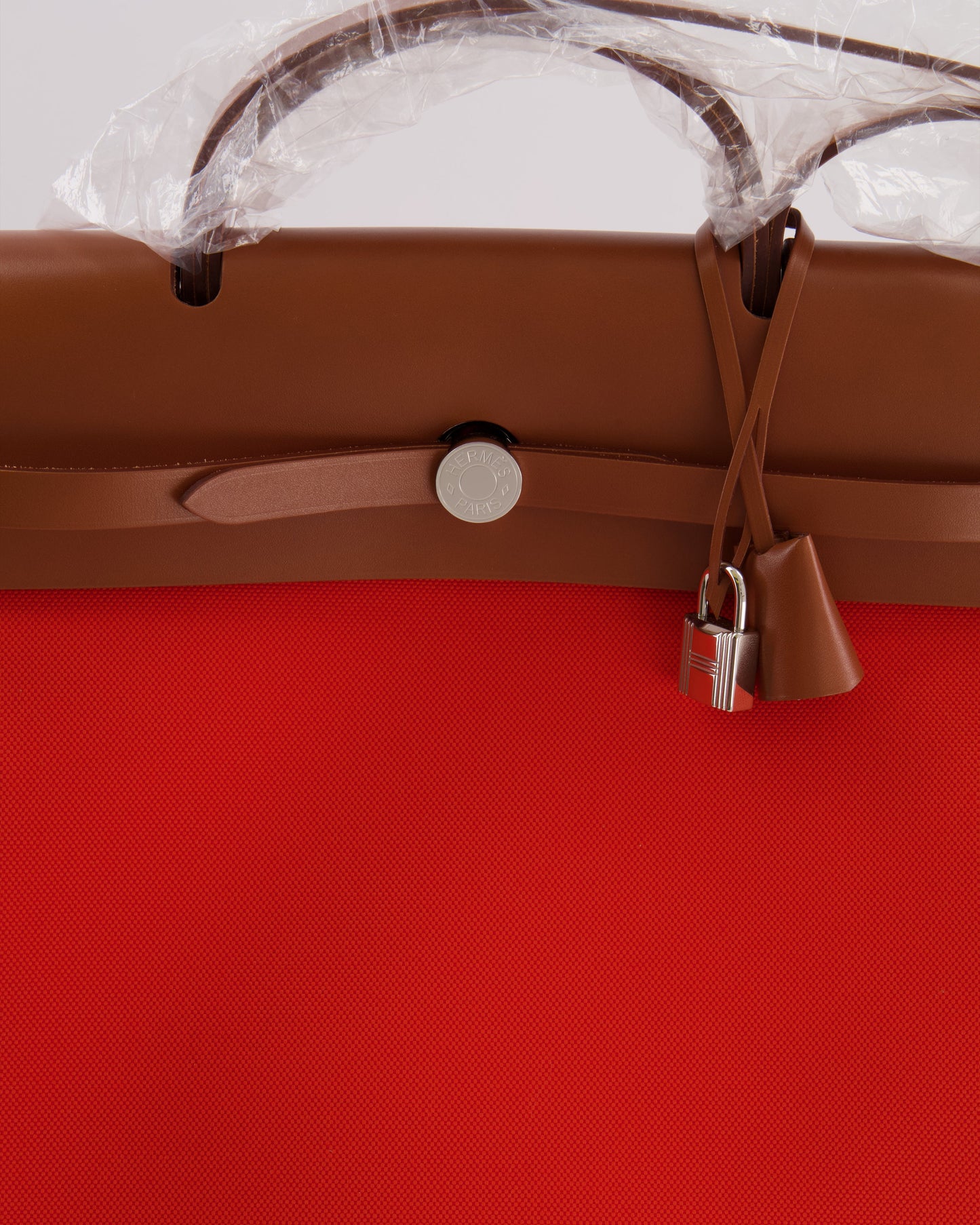 Hermès Herbag 39 in Orange Mecano Toile Canvas and Fauve Vache Hunter Leather with Palladium Hardware