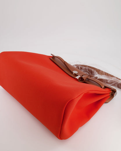 Hermès Herbag 39 in Orange Mecano Toile Canvas and Fauve Vache Hunter Leather with Palladium Hardware