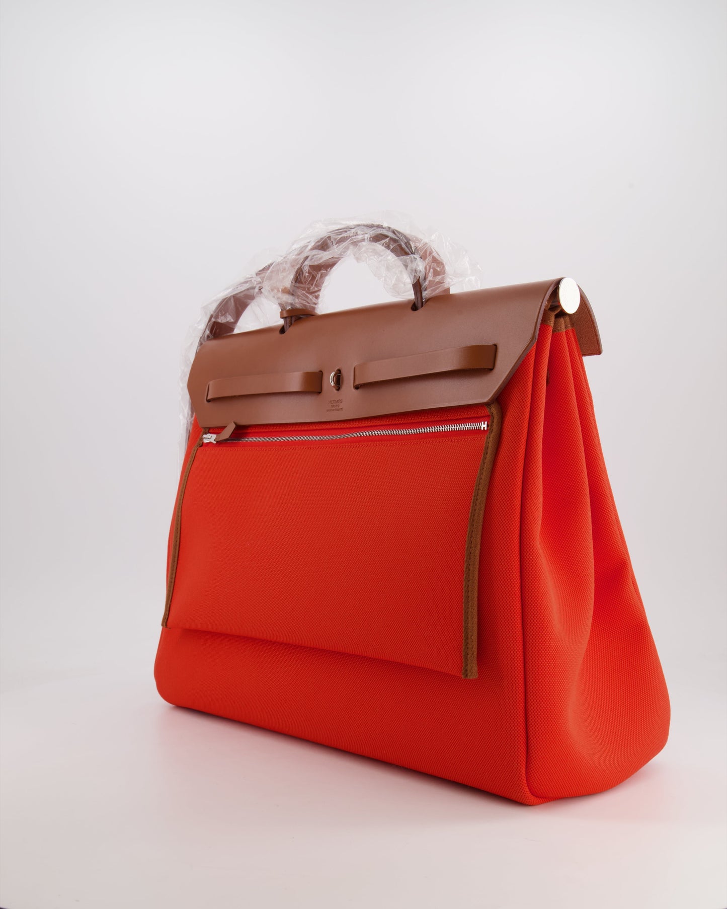 Hermès Herbag 39 in Orange Mecano Toile Canvas and Fauve Vache Hunter Leather with Palladium Hardware