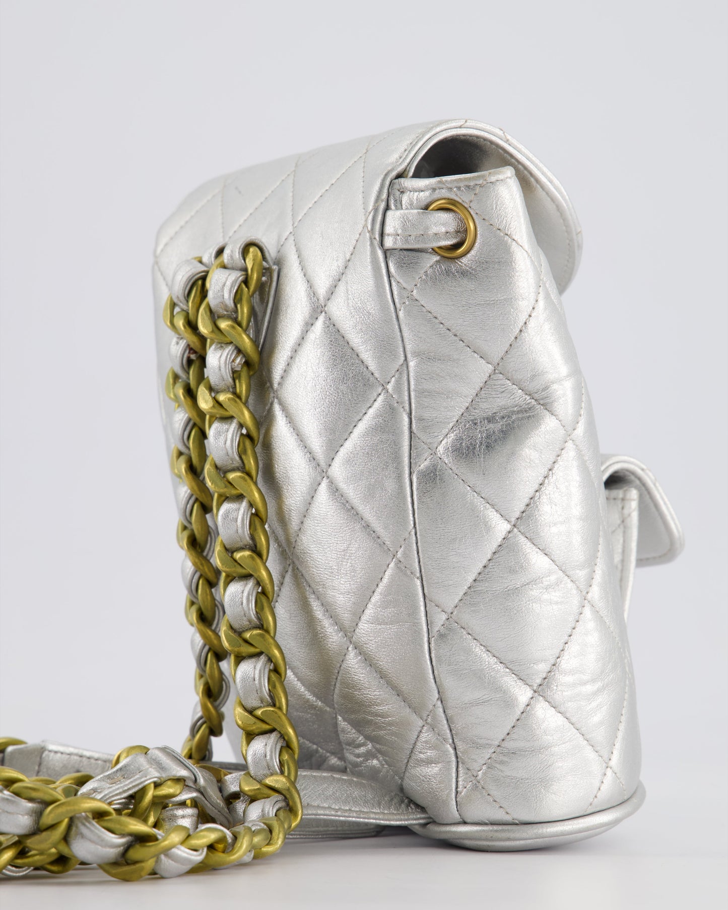*RARE* Chanel Metallic Silver Vintage Mini Duma Backpack Bag in Lambskin Leather with 24K Gold Hardware