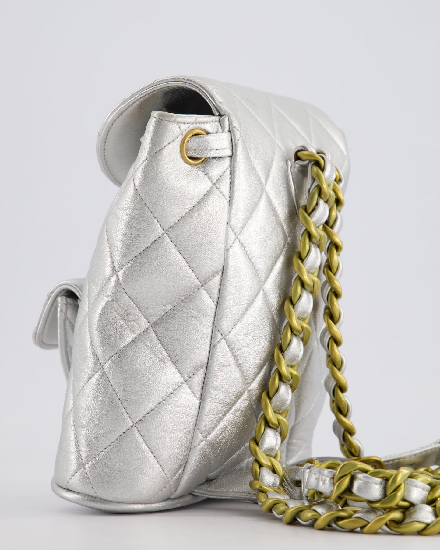*RARE* Chanel Metallic Silver Vintage Mini Duma Backpack Bag in Lambskin Leather with 24K Gold Hardware
