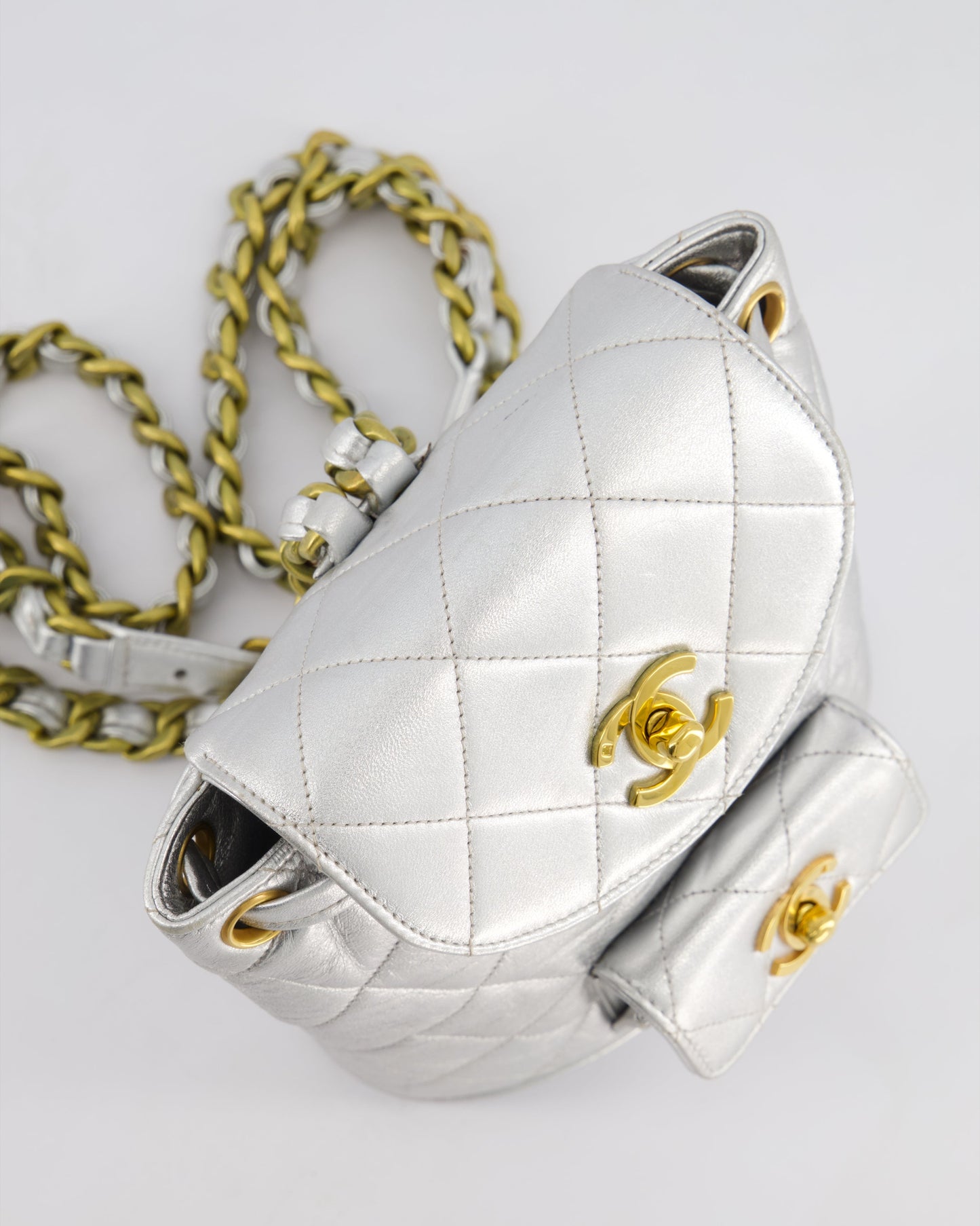 *RARE* Chanel Metallic Silver Vintage Mini Duma Backpack Bag in Lambskin Leather with 24K Gold Hardware