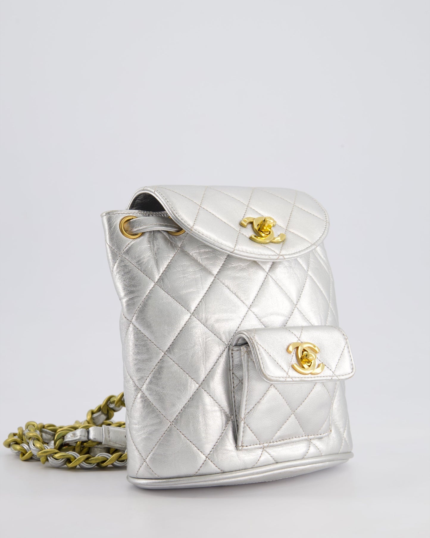 *RARE* Chanel Metallic Silver Vintage Mini Duma Backpack Bag in Lambskin Leather with 24K Gold Hardware