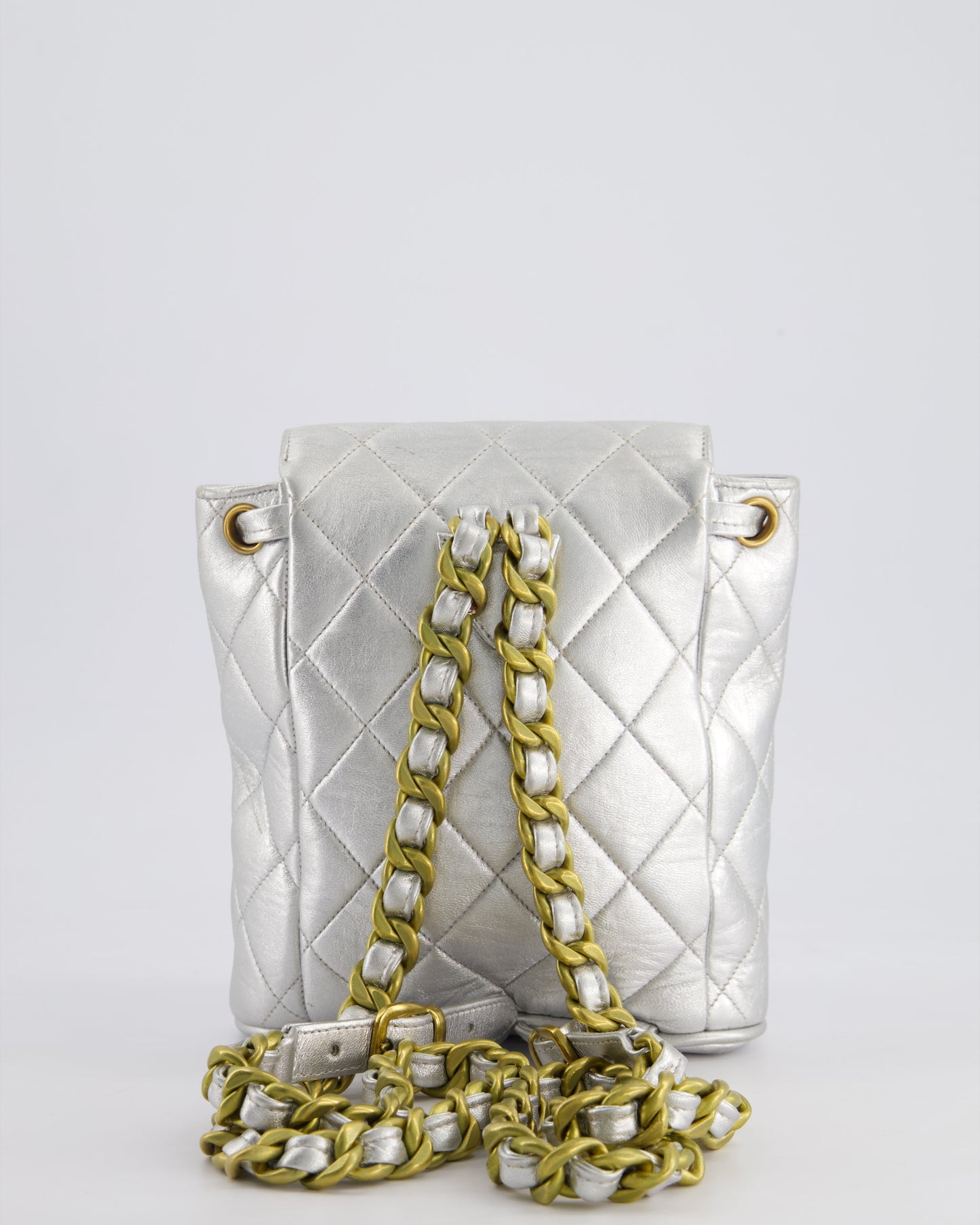 *RARE* Chanel Metallic Silver Vintage Mini Duma Backpack Bag in Lambskin Leather with 24K Gold Hardware