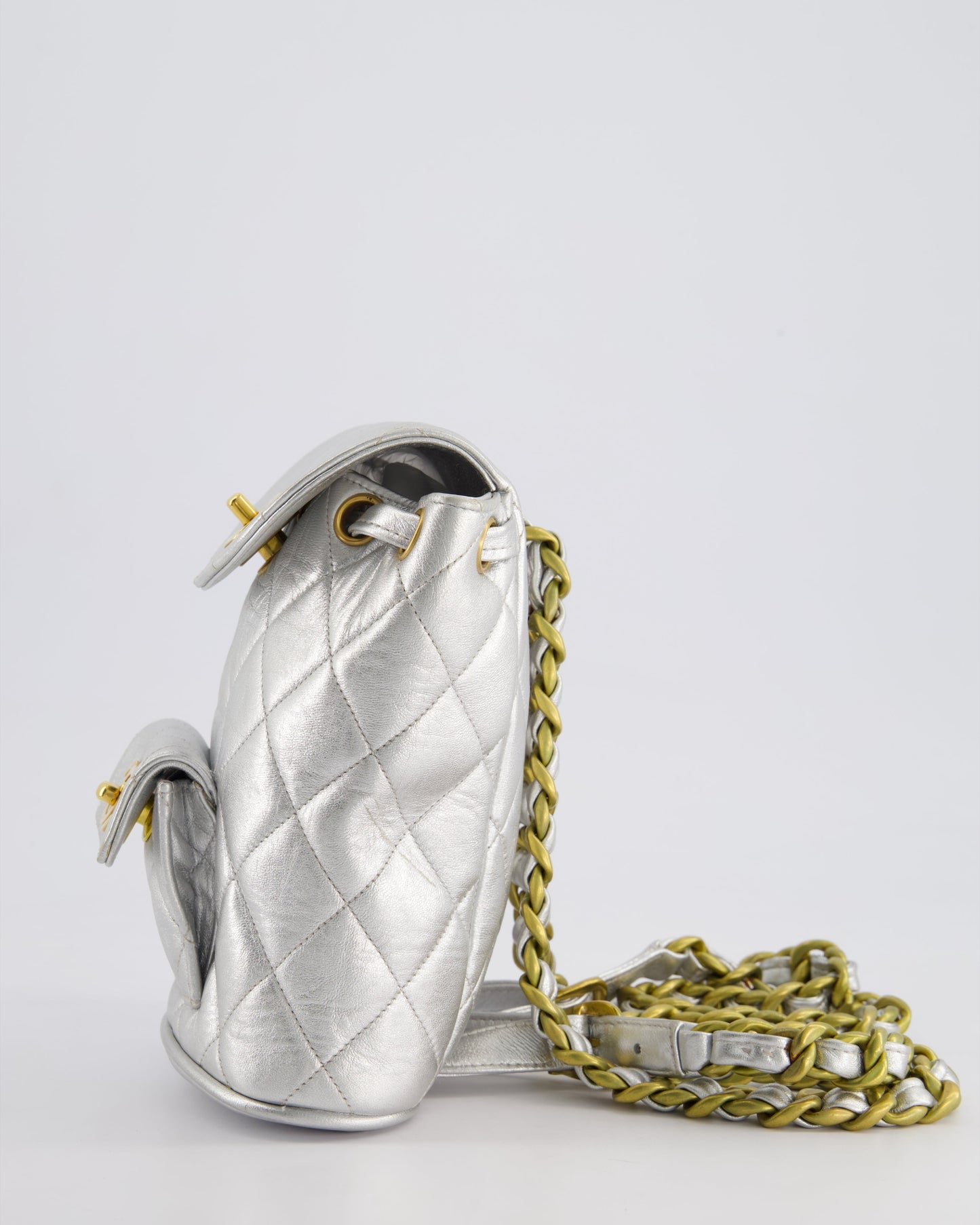 *RARE* Chanel Metallic Silver Vintage Mini Duma Backpack Bag in Lambskin Leather with 24K Gold Hardware