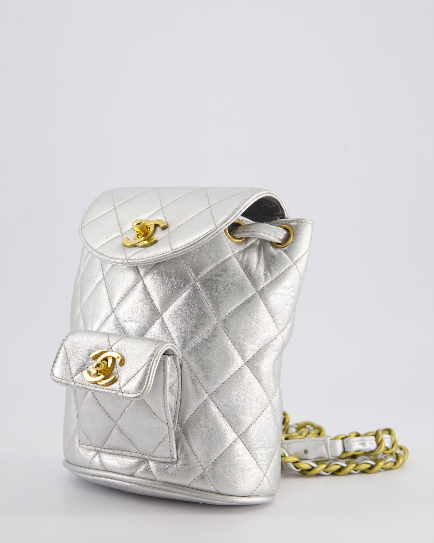 *RARE* Chanel Metallic Silver Vintage Mini Duma Backpack Bag in Lambskin Leather with 24K Gold Hardware