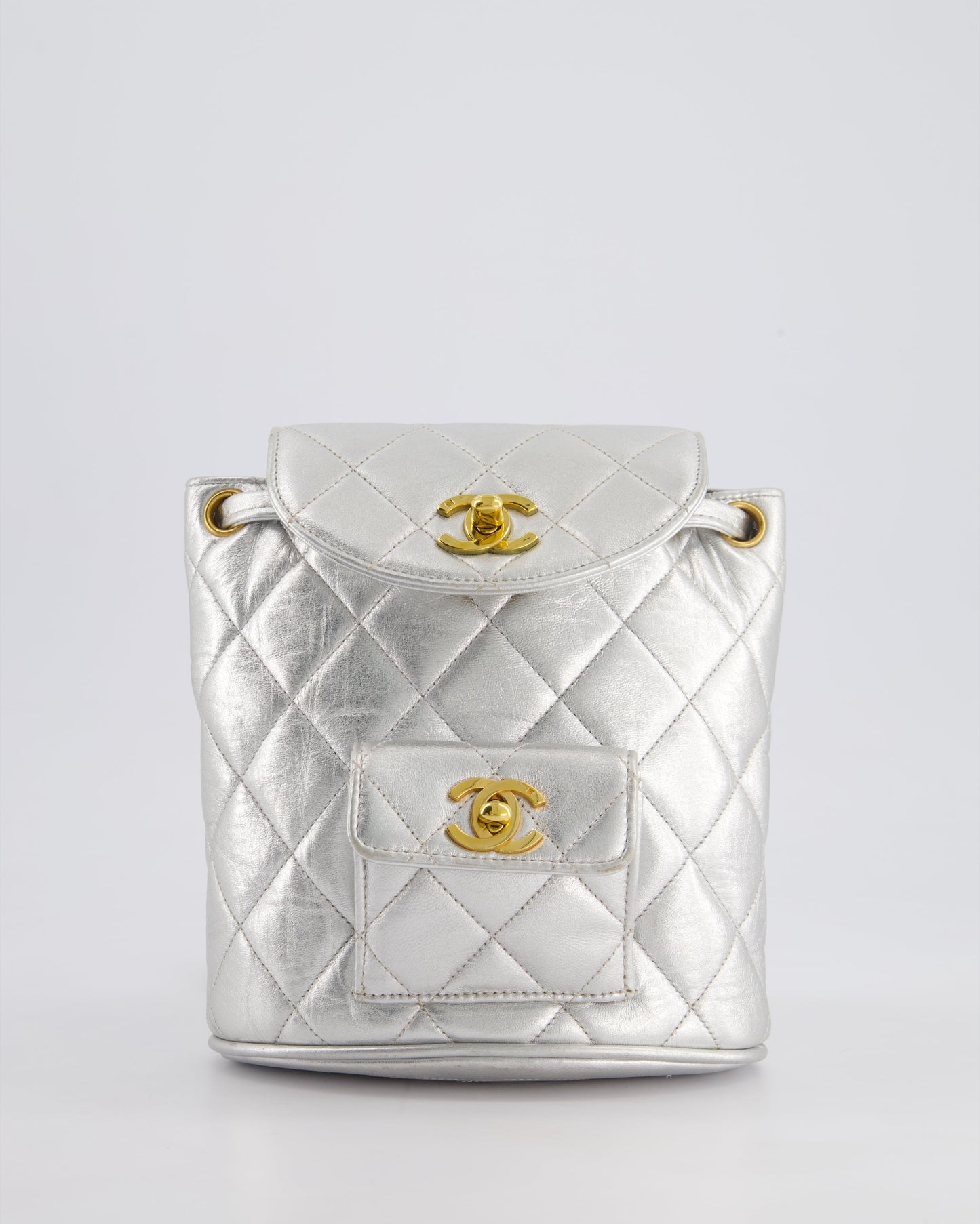 *RARE* Chanel Metallic Silver Vintage Mini Duma Backpack Bag in Lambskin Leather with 24K Gold Hardware