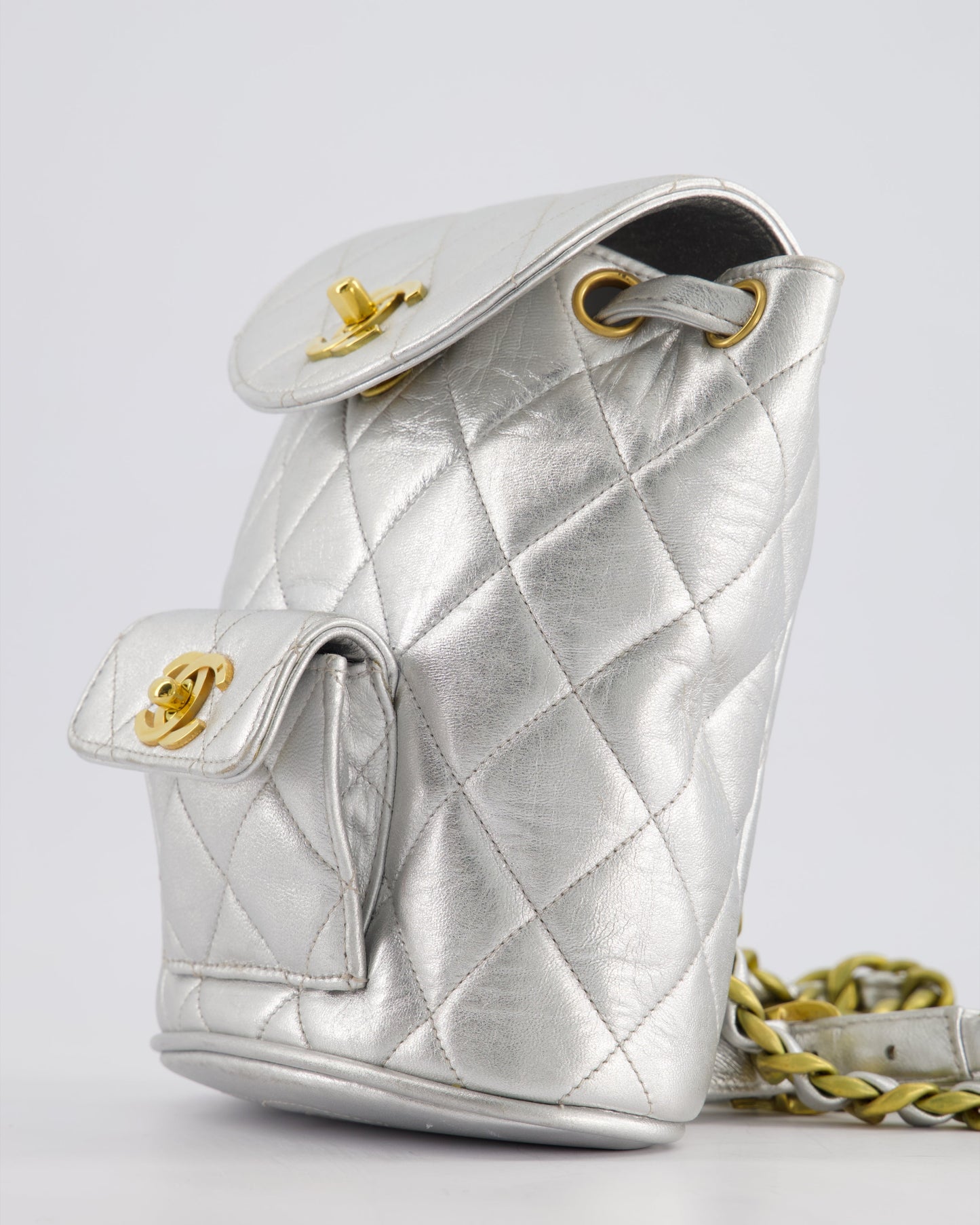 *RARE* Chanel Metallic Silver Vintage Mini Duma Backpack Bag in Lambskin Leather with 24K Gold Hardware