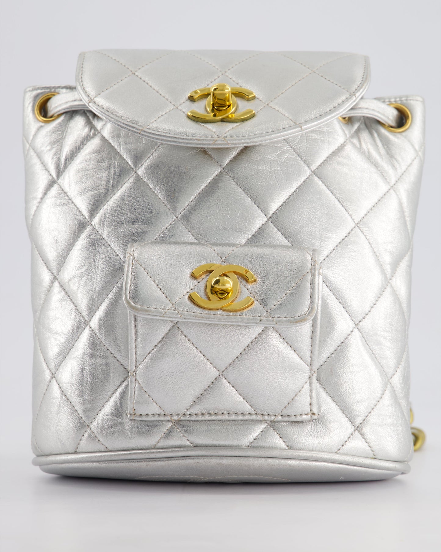 *RARE* Chanel Metallic Silver Vintage Mini Duma Backpack Bag in Lambskin Leather with 24K Gold Hardware