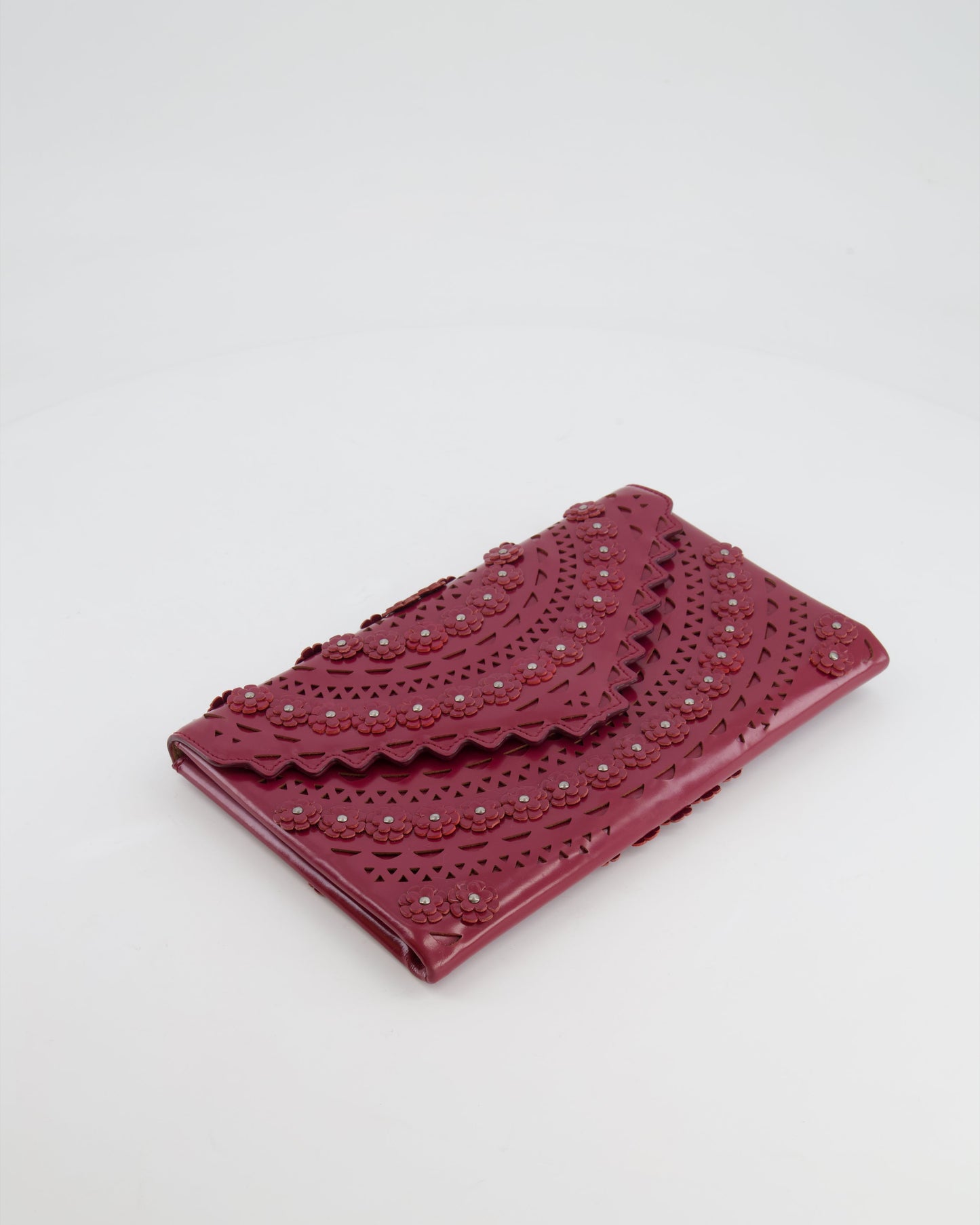 Alaïa Burgundy Patent Leather Floral Oum Clutch Bag with Silver Hardware RRP £2,200