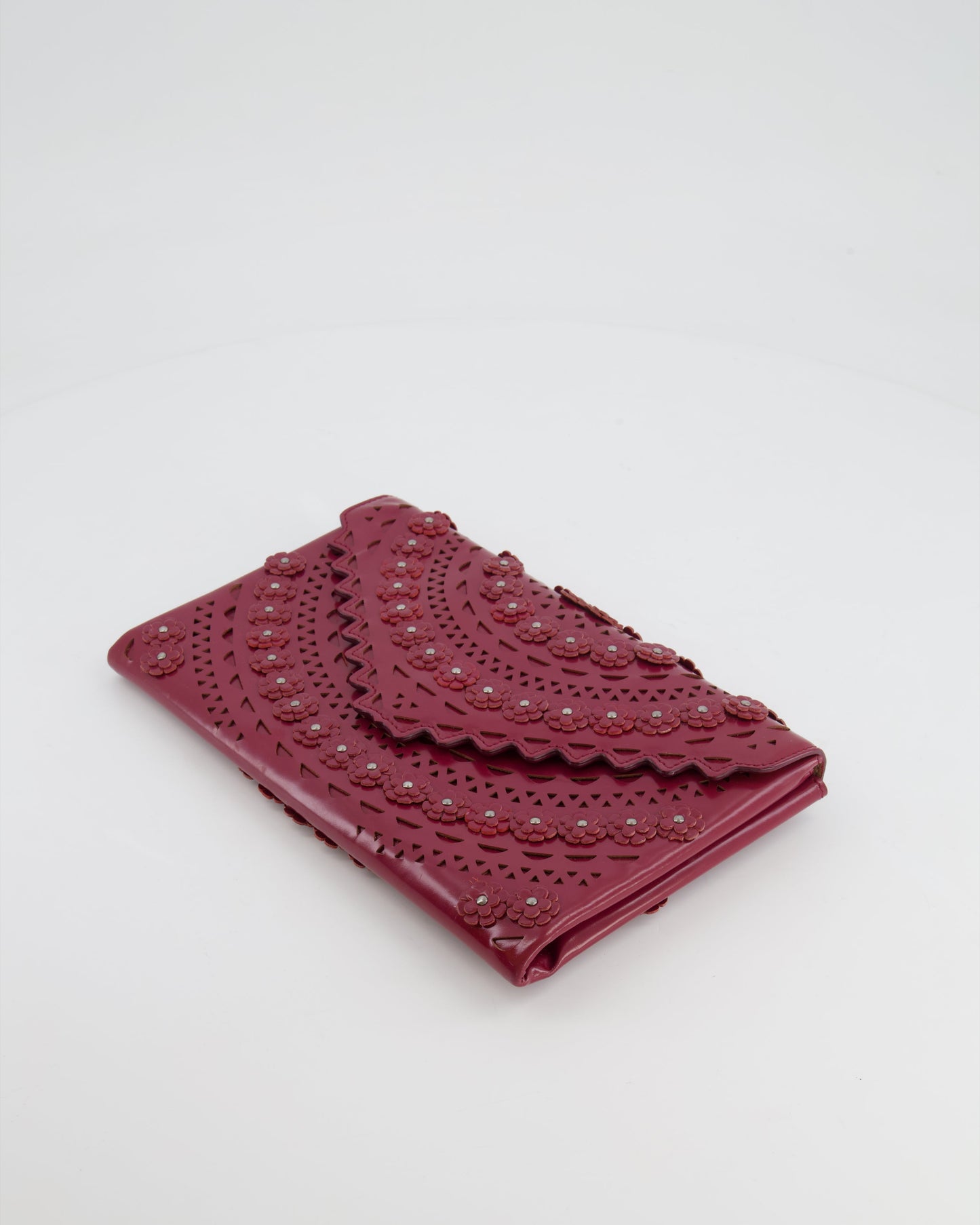 Alaïa Burgundy Patent Leather Floral Oum Clutch Bag with Silver Hardware RRP £2,200