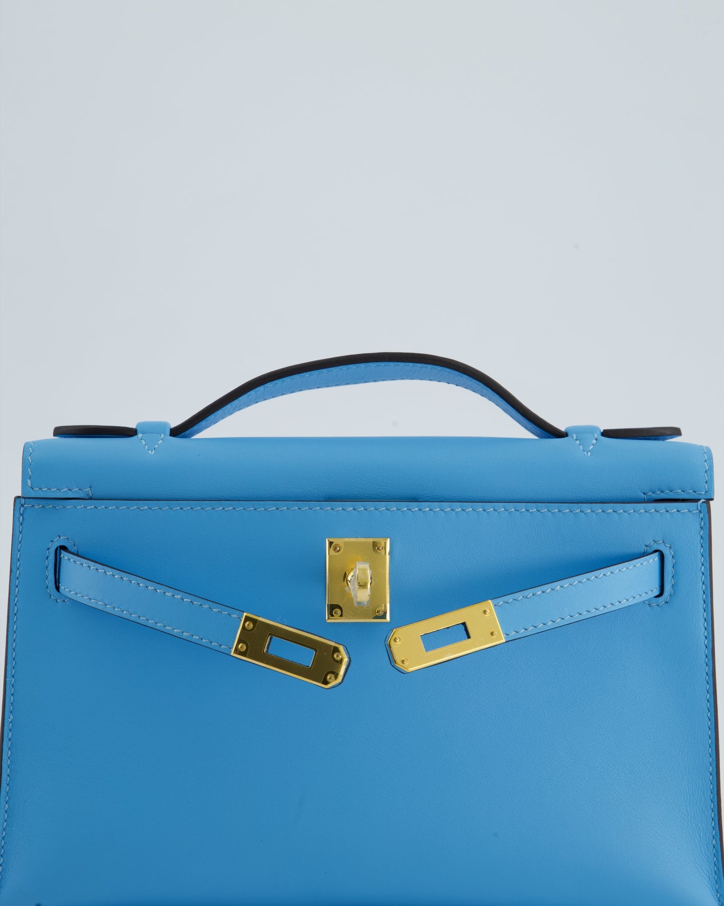 Hermès Kelly Pochette Bag in Bleu Celeste Swift Leather with Gold Hardware
