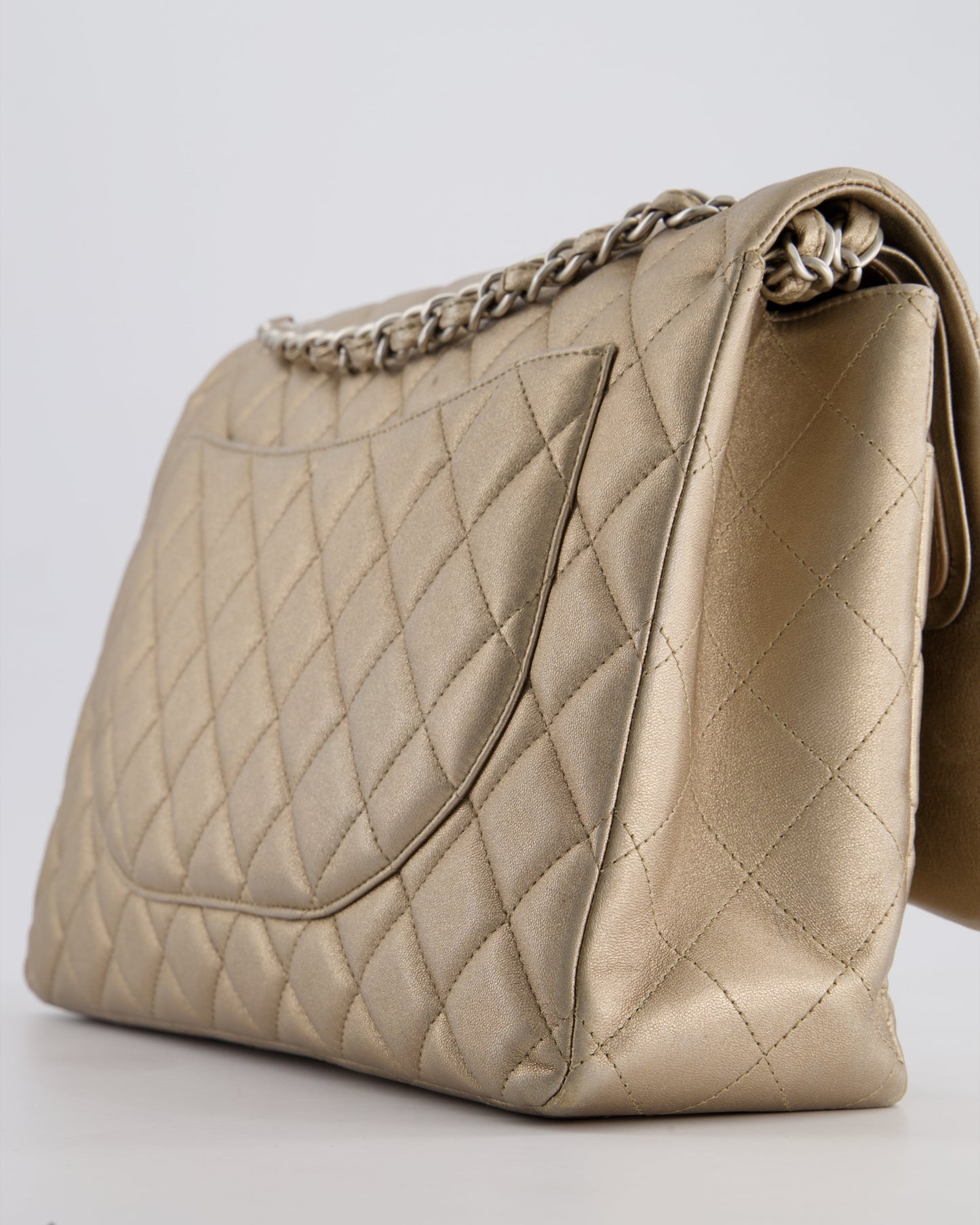 Chanel Metallic Gold Maxi Classic Double Flap Bag in Calfskin Leather with Brushed Silver Hardware