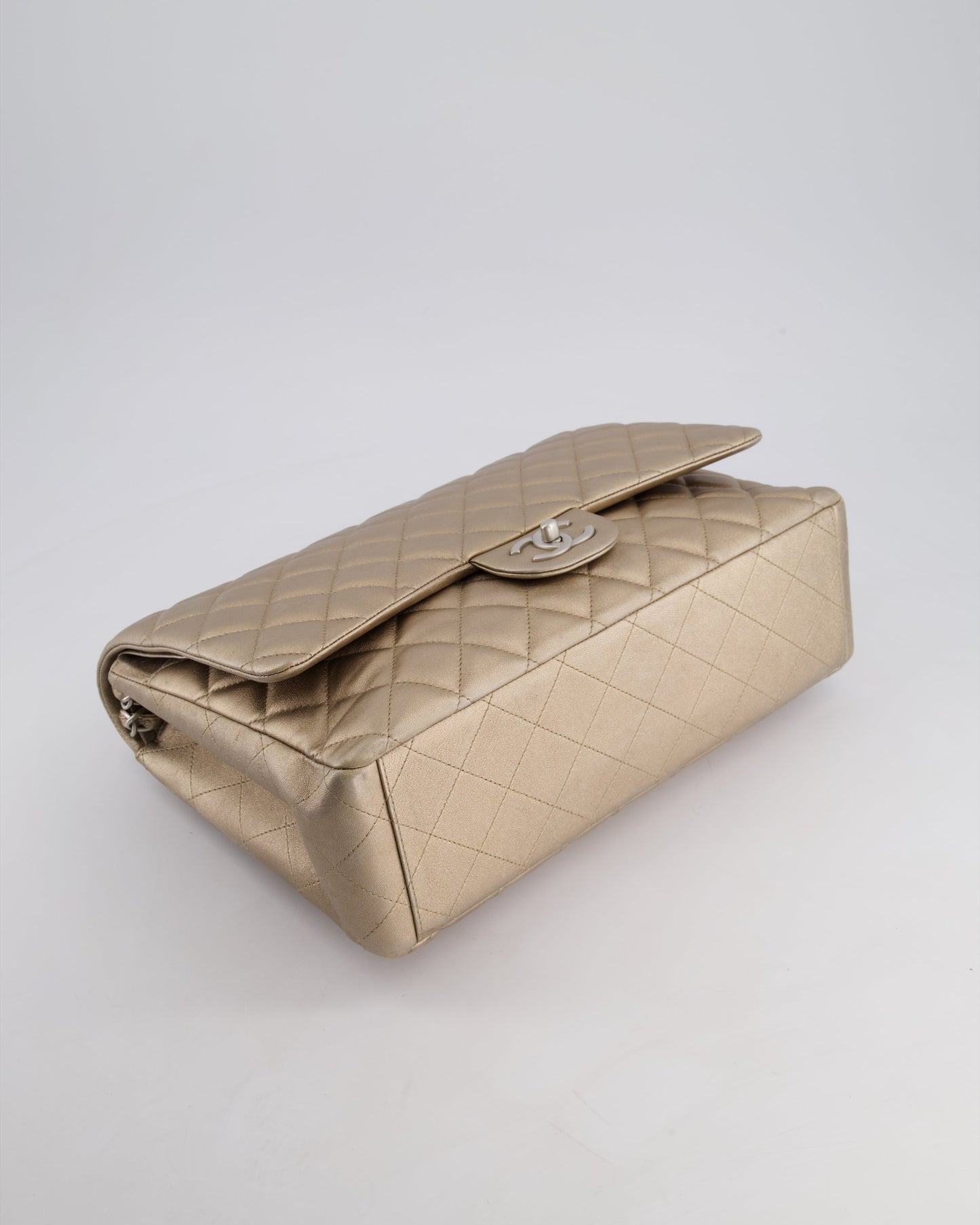 Chanel Metallic Gold Maxi Classic Double Flap Bag in Calfskin Leather with Brushed Silver Hardware