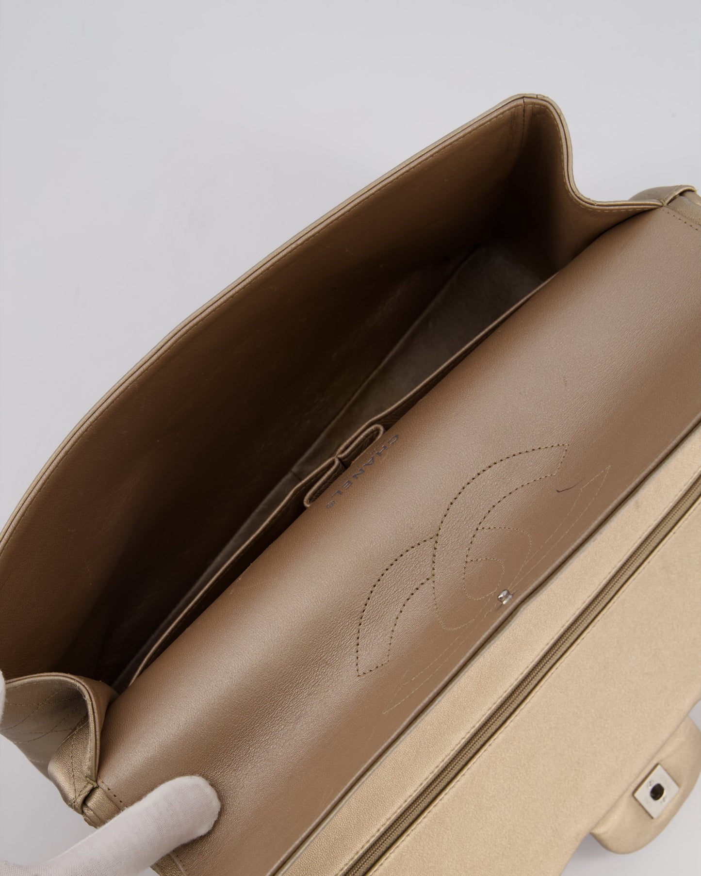 Chanel Metallic Gold Maxi Classic Double Flap Bag in Calfskin Leather with Brushed Silver Hardware